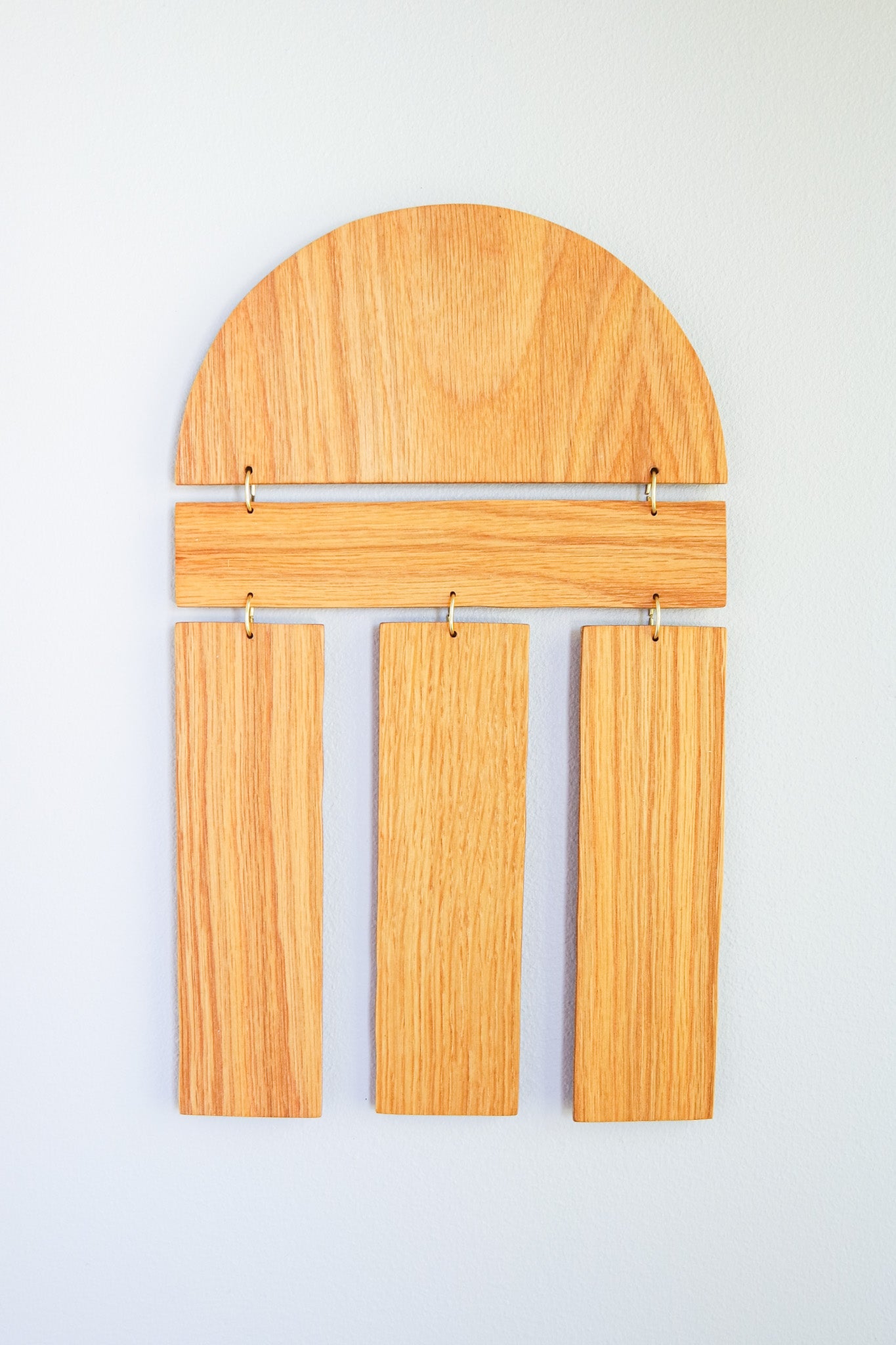 Front view of medium size wooden wall hanging made from salvaged wood. A product of Wall Echoes.